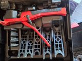 a tool box with tools in it sitting on a table