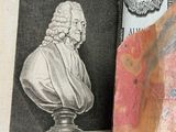 an open book with a drawing of a bust on it