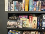 a lot of games on the shelves in the store