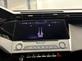 a picture of a car dashboard with a digital display