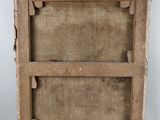 an old wooden box with a piece of wood sticking out of it