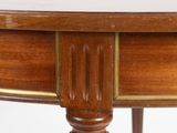 a wooden table with a wooden top and a wooden base