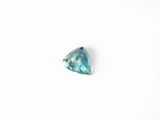 a trillion cut blue topazte gems on a white background