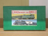 a green box with a picture of a train on it