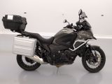 a picture of a motorcycle that is parked in a room