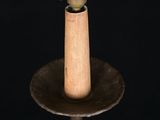 an image of a candle that is on top of a table