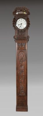 Horloge comtoise dite "saint Nicolas" en chêne sculpté à déc…