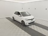 a picture of a small white car in a garage