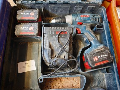 a tool box with tools in it on a table
