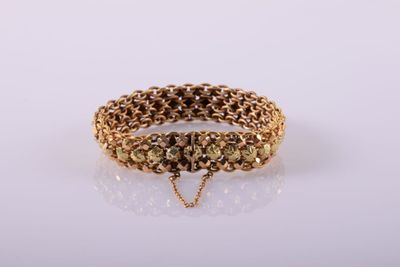 Bracelet en or 18 carats Nota : petit accro et décoloration - Photo 1