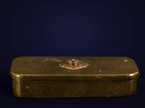 gold bar with a crown on it on a dark blue background