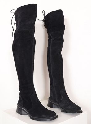 CHANTAL THOMASS, Paris. Cuissardes en daim noir à lacets. Po…