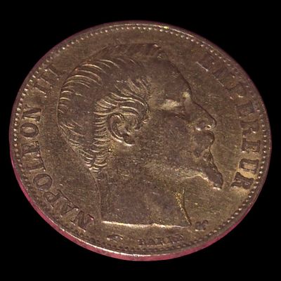 an image of a gold coin with a woman ' s face on it