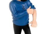 une figurine représentant un homme barbu coiffé d'un chapeau