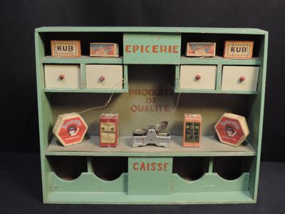 an old wooden cabinet with a lot of items on it