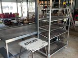 a large room with a lot of shelves and tables