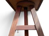 a wooden table with a wooden top on a white background