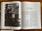 an open book with a picture of a man sitting at a desk
