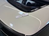 a sticker on the hood of a car that says quatto