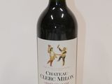 a bottle of wine that is sitting on a table