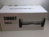the box of the smart wheelie is open on the table