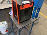 a machine that is sitting on a table in a factory