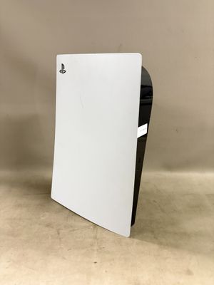 un gros plan d'un ordinateur blanc et noir posé sur une table