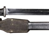 two knives that are sitting side by side on a white surface