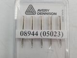 four needle needles in a plastic package with a white background