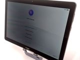 a tablet that is sitting on top of a stand