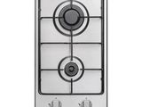 a silver stove top with three burners on it