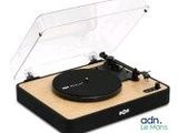 a close up of a turntable with a clear cover on it