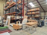 a large warehouse filled with lots of different types of wood