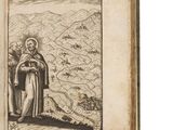 un vieux livre sur lequel figure le dessin d'un homme debout devant une montagne