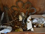 a wooden box filled with assorted items on the floor