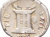 an old silver coin with a chinese writing on it