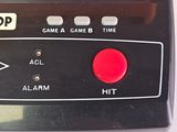 a close up of a game controller on a table