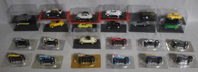 a lot of toy cars that are in a display case