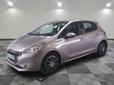 a picture of a pink car in a showroom