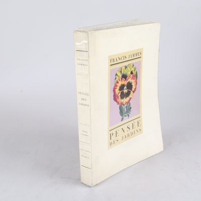 un livre blanc avec l'image d'une fleur sur la couverture