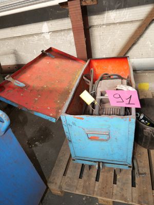 a blue box with a red lid and a blue box with a red lid and a blue box with a red lid and a blue box with a red