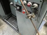 an image of a machine that has a bunch of knobs on it