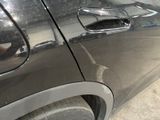 a close up of a car ' s door handle and door handle