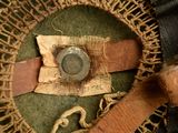 a piece of cloth and a metal object on a piece of cloth