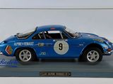 a model of a blue race car in a display case