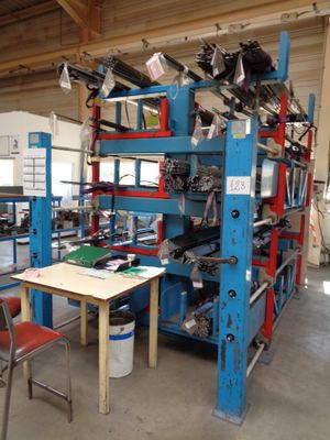 an image of a room filled with lots of machines and a table