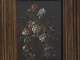 a painting of flowers in a wooden frame on a wall