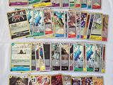 some of the pokemon cards are laying on a white surface