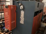 a machine that is sitting inside of a building