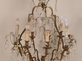 an image of a chandelier hanging from a ceiling in a room